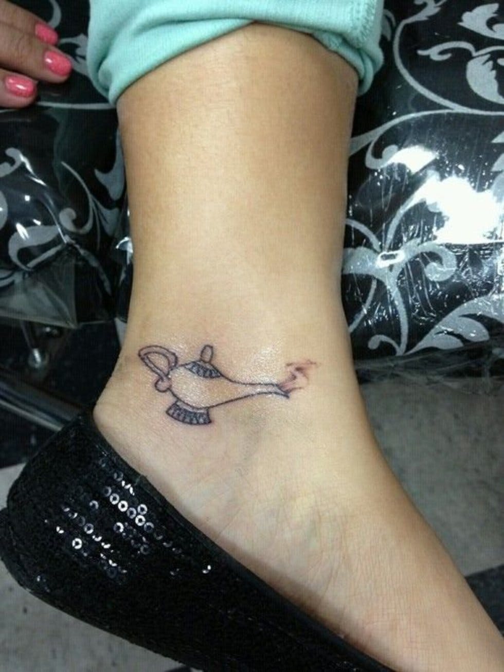 Small Toy Story Slinky Dog Ankle Tattoo Ideas For Women