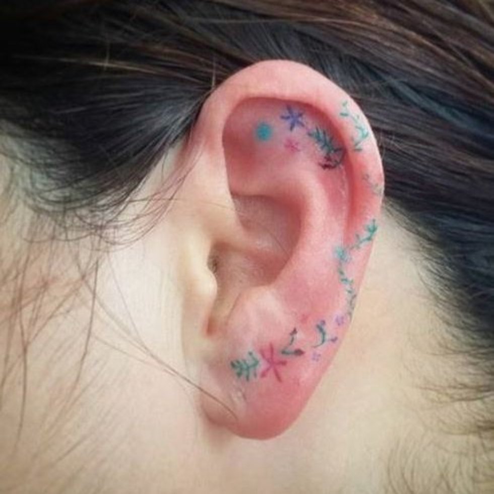 flower tattoo on ear