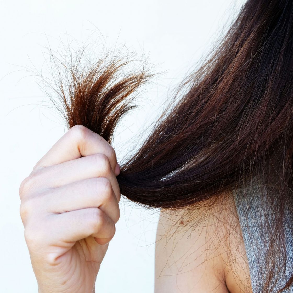 putting perfume in hair